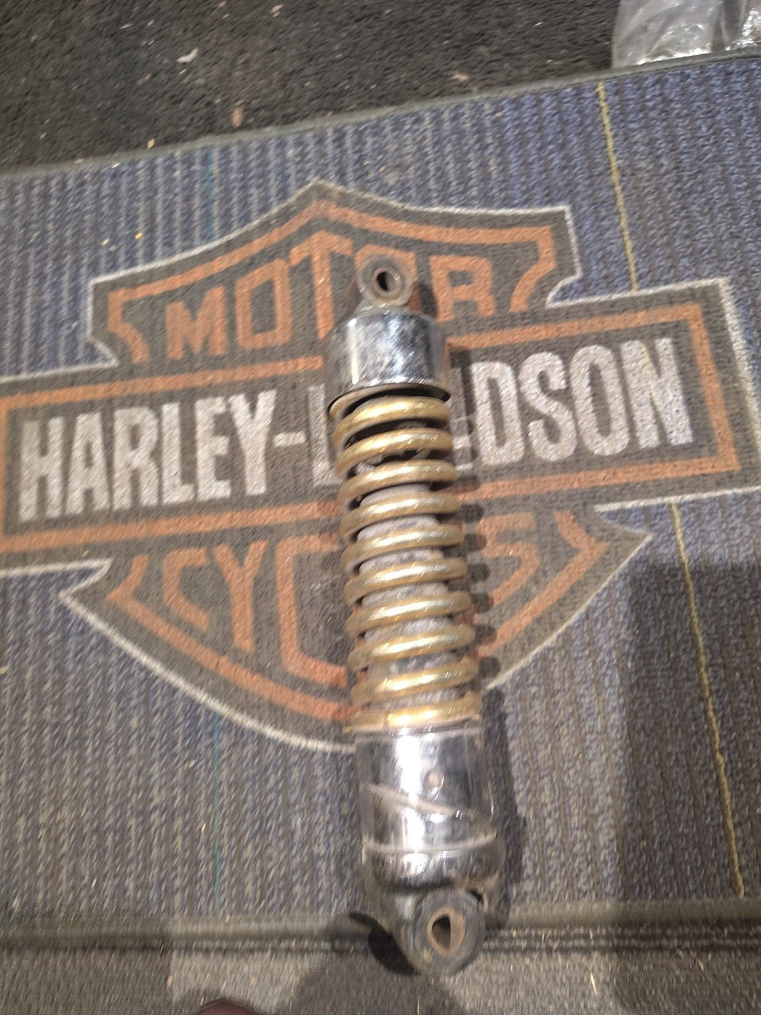 Gold Harley-Davidson Motorcycle Shock