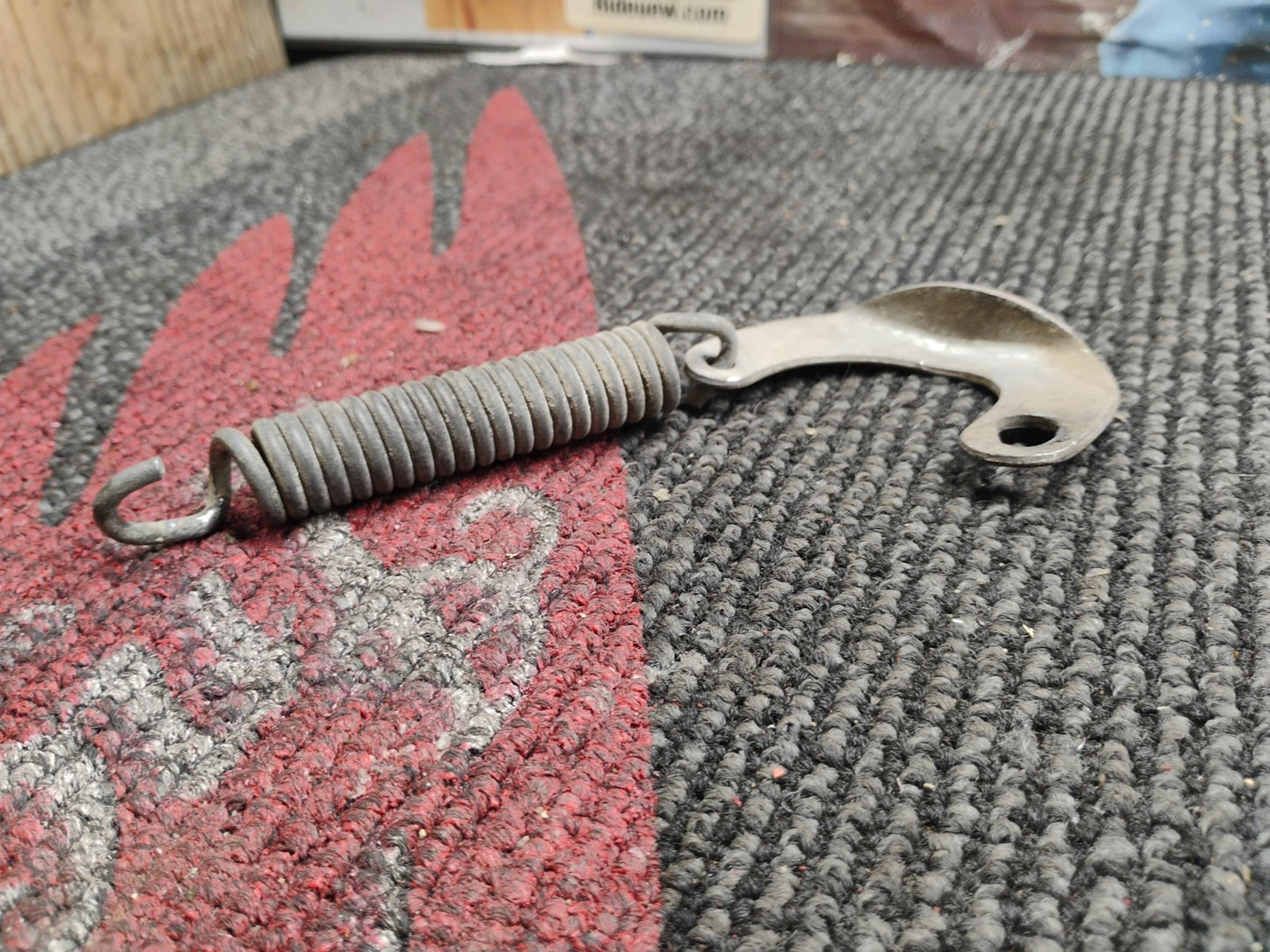 1974 Honda CB125S centerstand mounting spring & bracket 