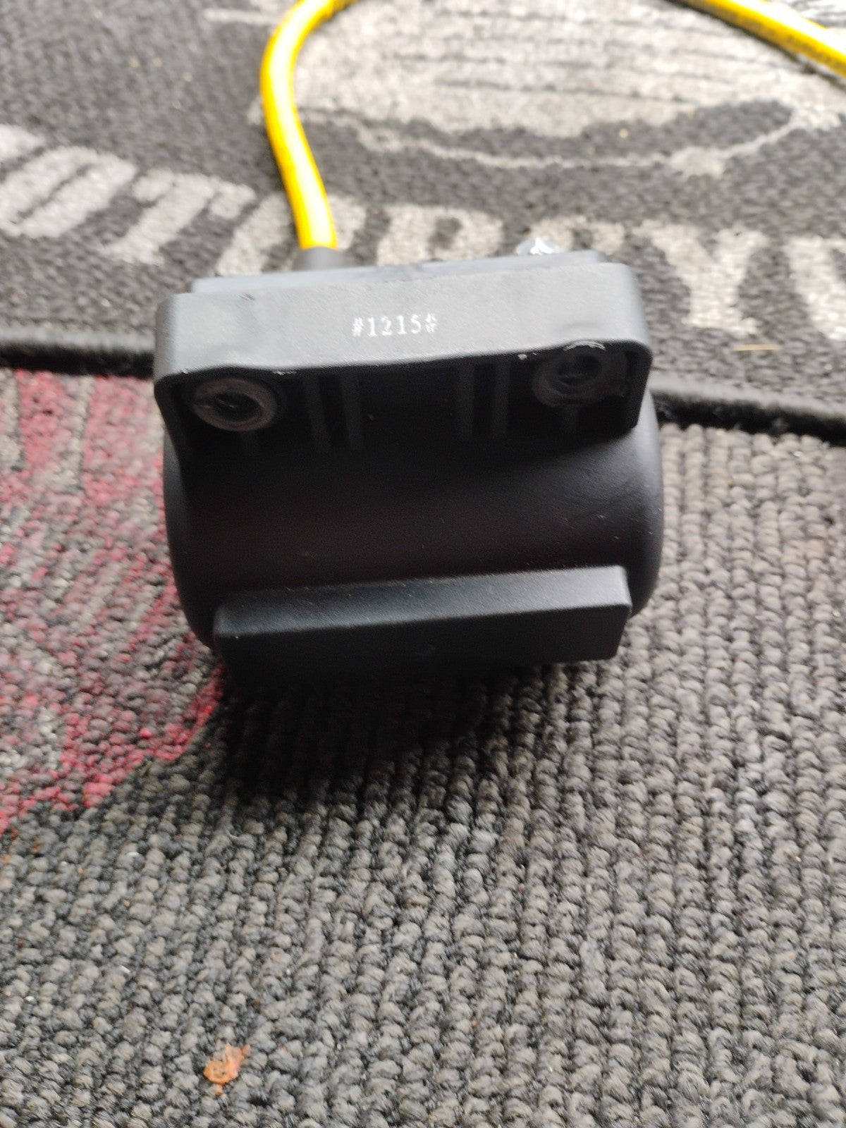 Genuine OEM Harley-Davidson ignition coil, part number 31614-95, removed from a