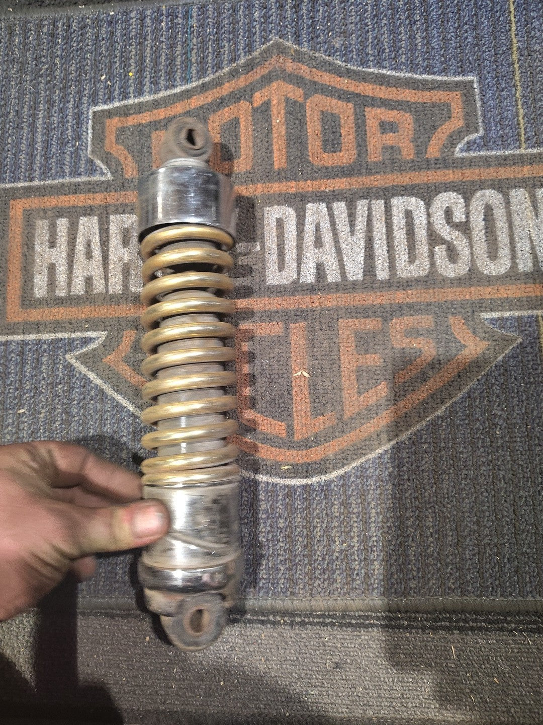 Gold Harley-Davidson Motorcycle Shock