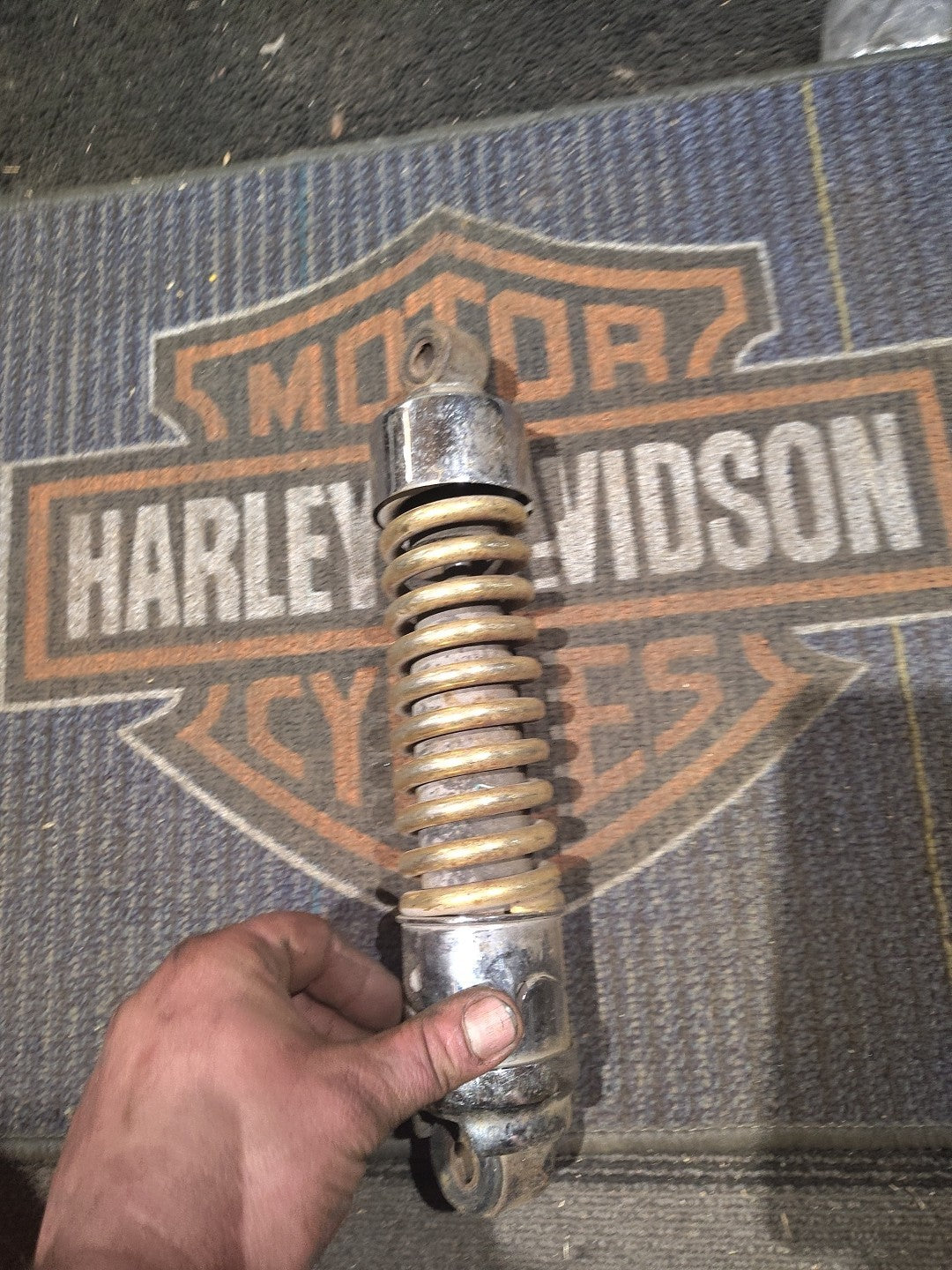 Gold Harley-Davidson Motorcycle Shock