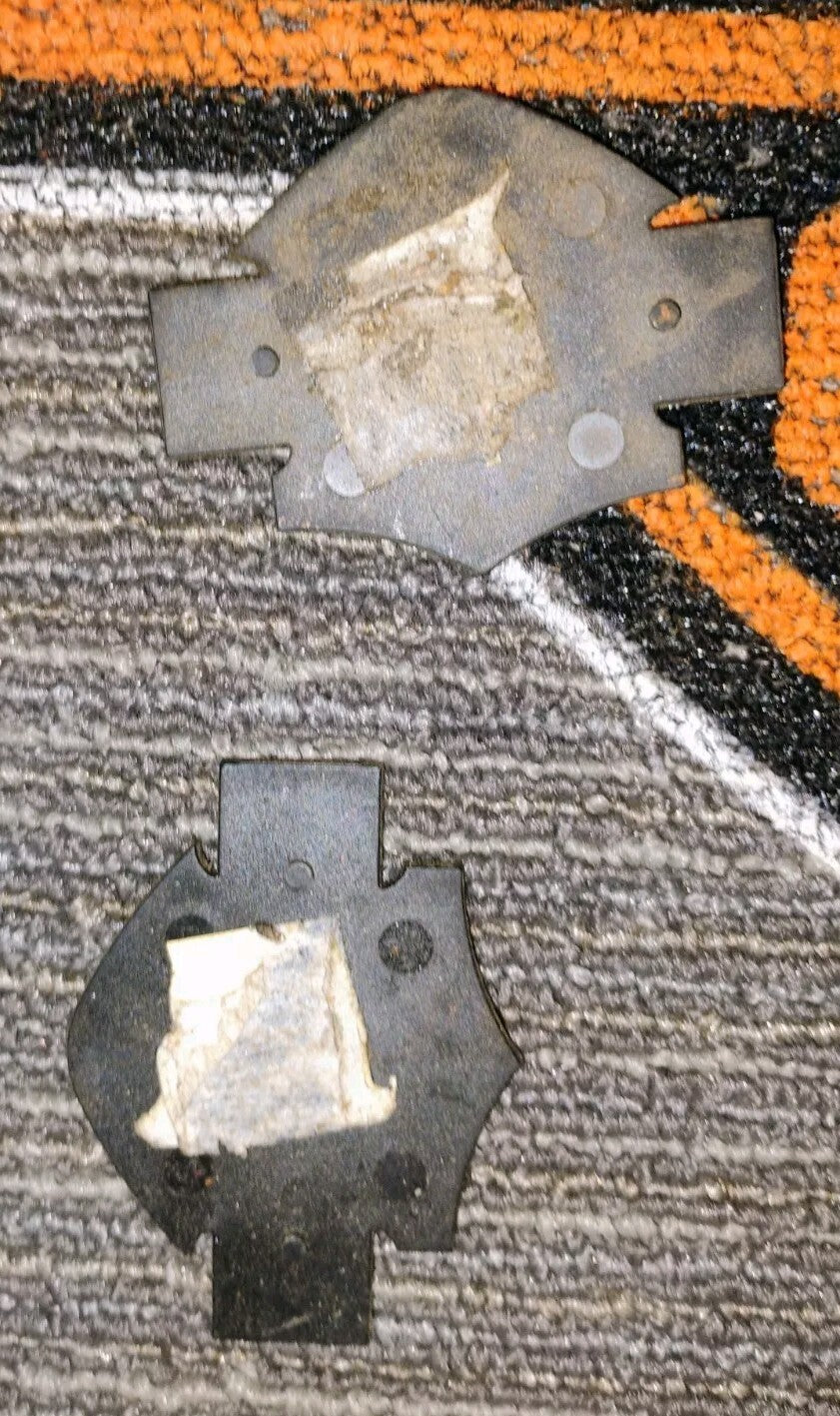 Plastic Harley Davidson Badges From A Display Case