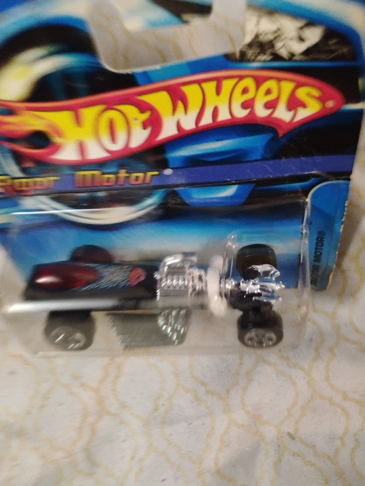 2005 Hot Wheels Rigor Motor #138 Black Short Card (Name Middle of Card)