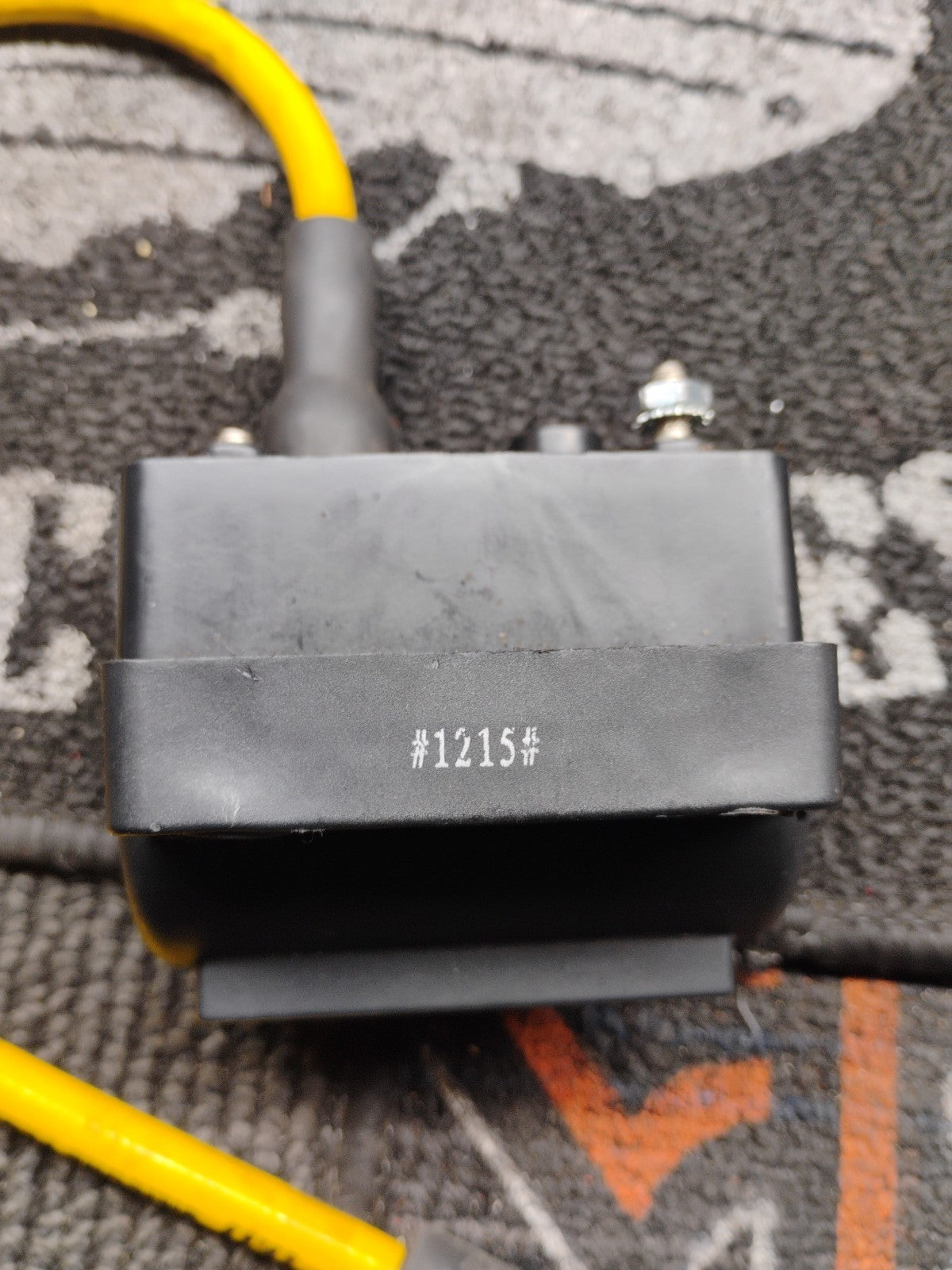Genuine OEM Harley-Davidson ignition coil, part number 31614-95, removed from a