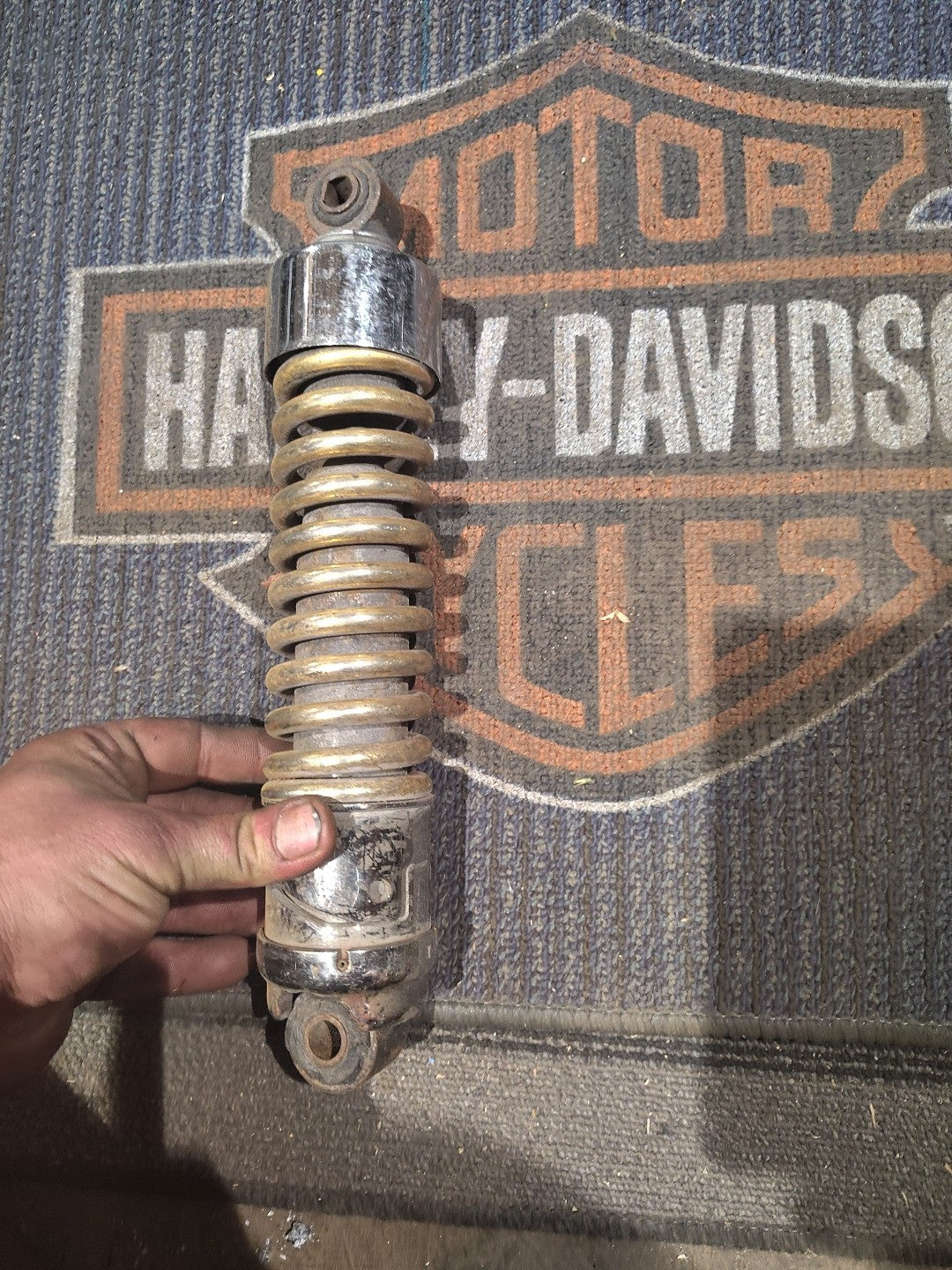 Gold Harley-Davidson Motorcycle Shock