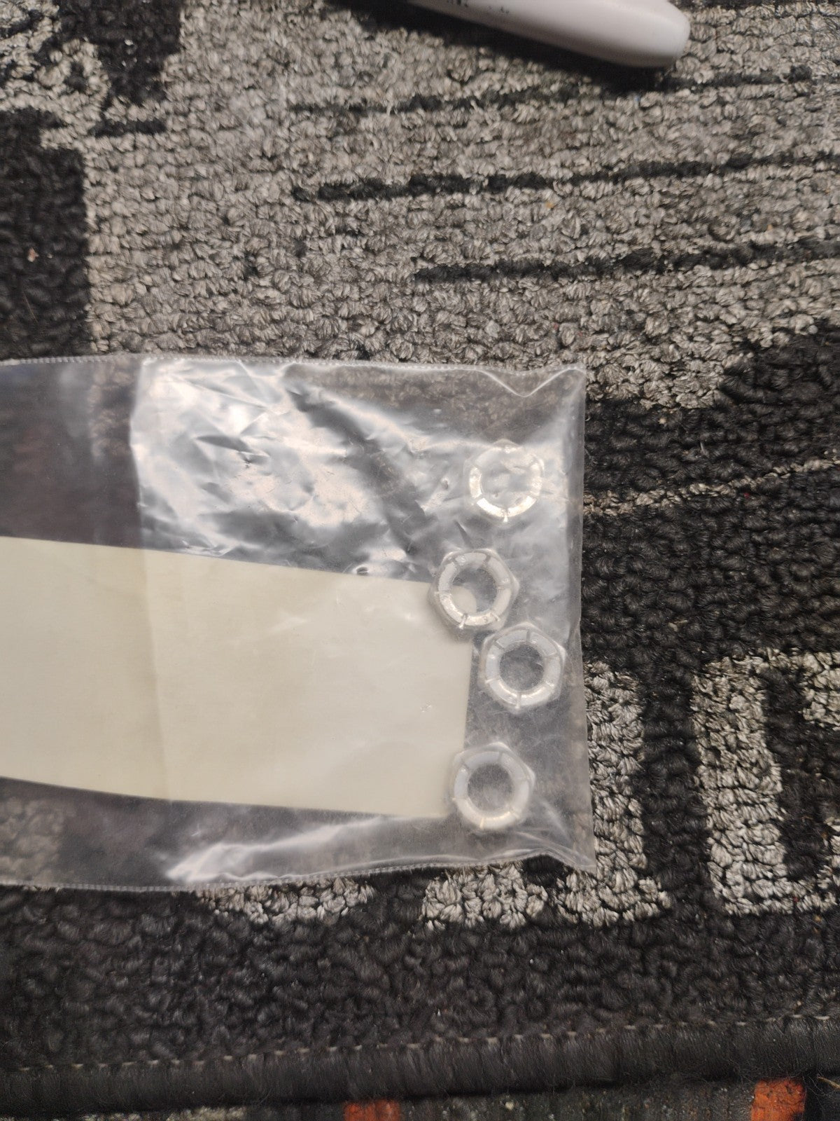 Buell OEM 7591Y Toe Peg Mount Nut Set Qty 4 NOS