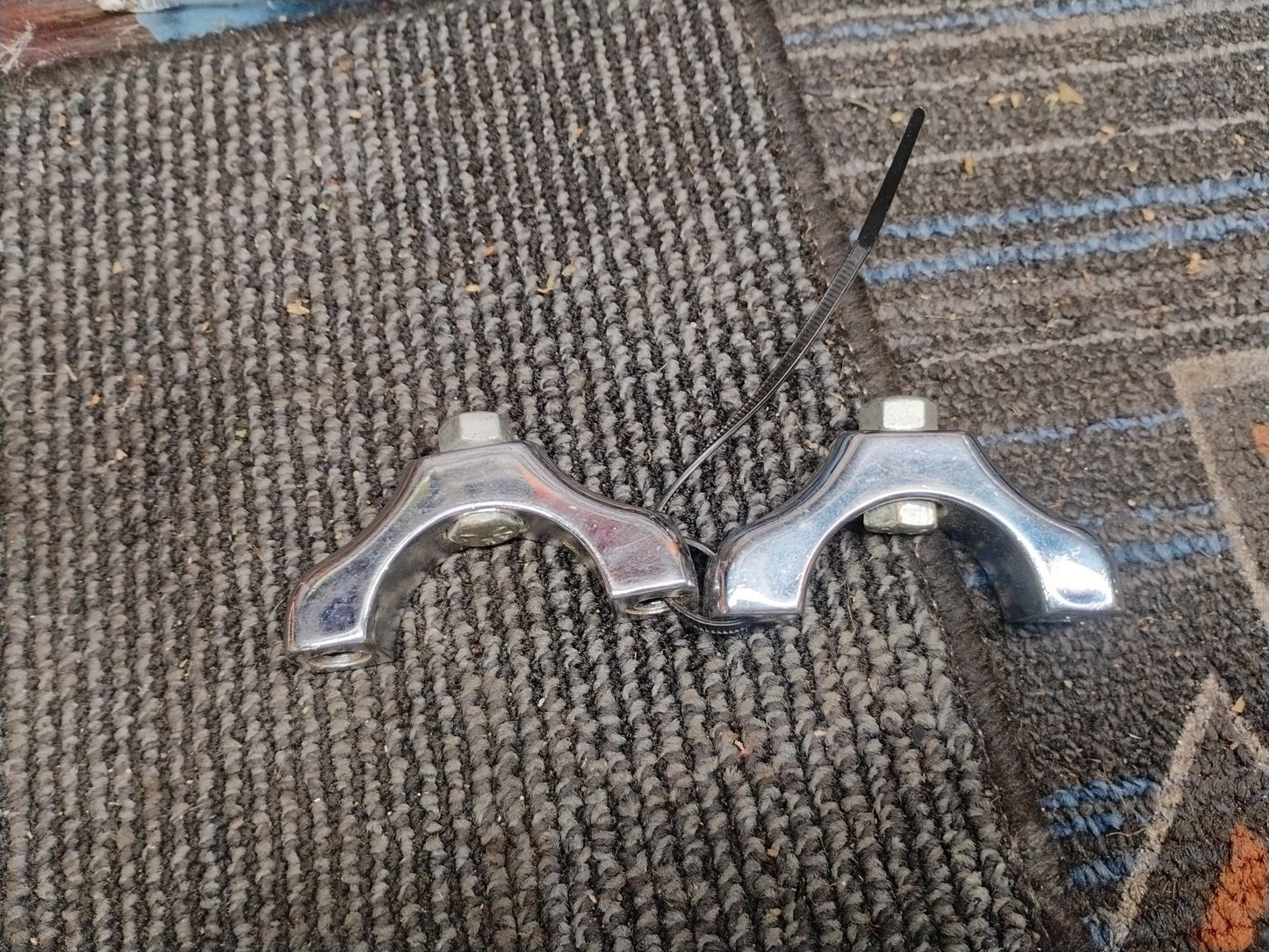 HARLEY Pair FRONT MOUNTING CLAMPs OEM 