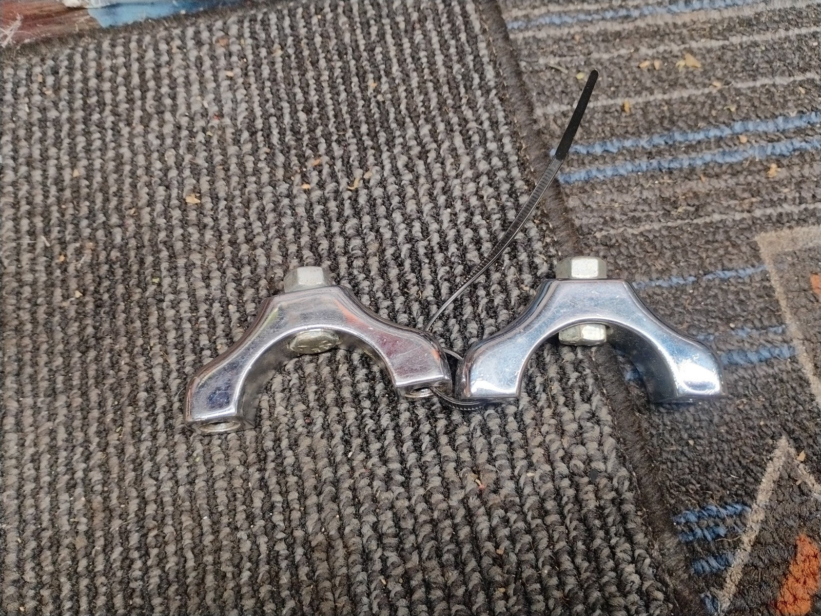 HARLEY Pair FRONT MOUNTING CLAMPs OEM 
