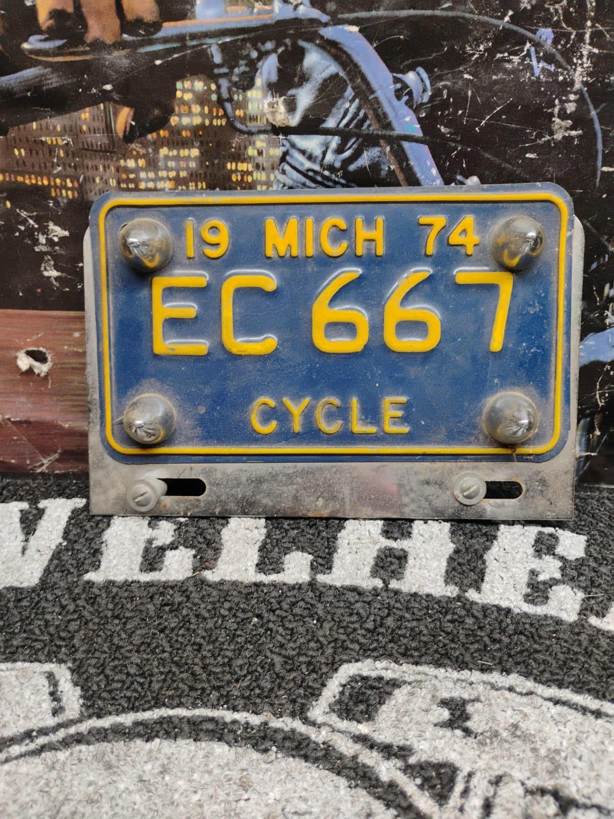 1974 MICHIGAN MOTORCYCLE LICENSE PLATE W/ MOUNT VINTAGE ORIGINAL MI TAG OEM STYL