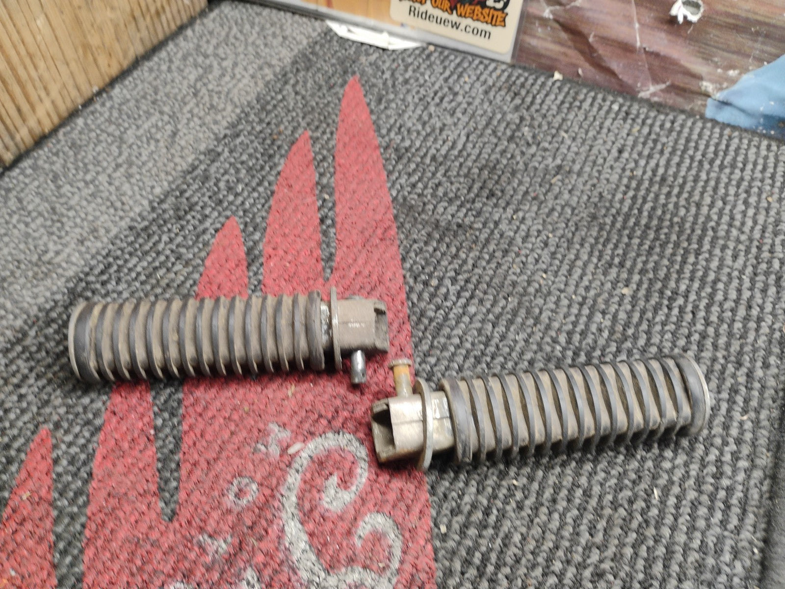 74 Honda CB 125 CB125 S rear back passenger foot rest pegs right left