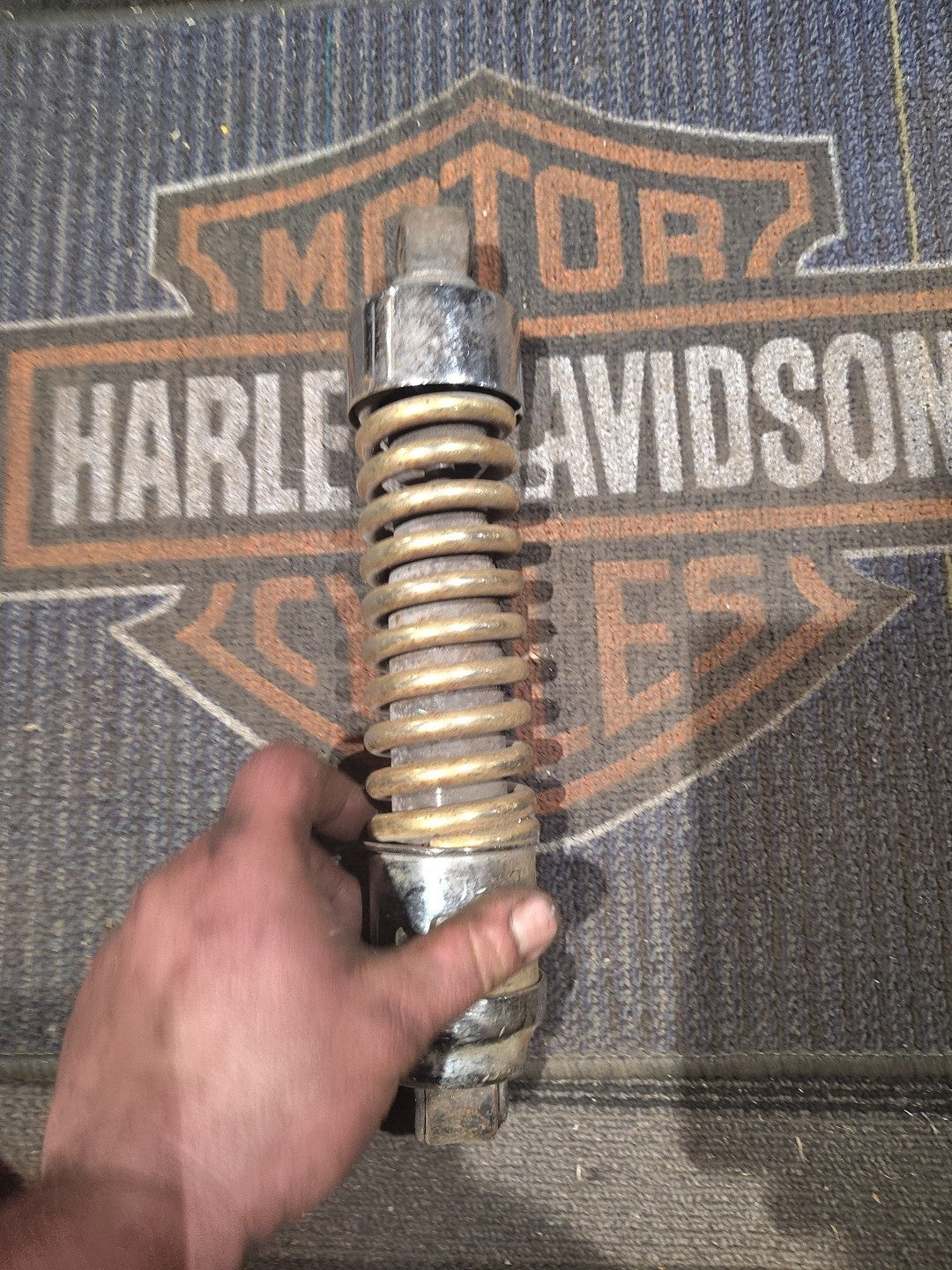 Gold Harley-Davidson Motorcycle Shock